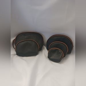 NWOT Set of 5 cosmetic bags. Various sizes.